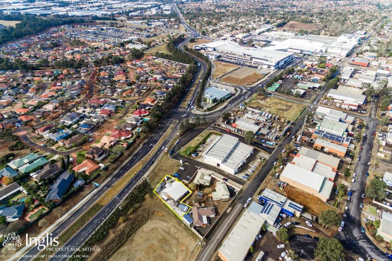 HIGHLY EXPOSED BUILDING & LAND